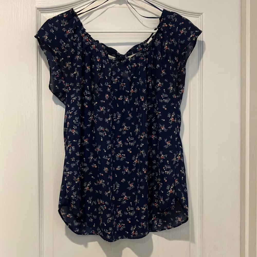 Floral print flutter sleeve blouse with tie at back of neck